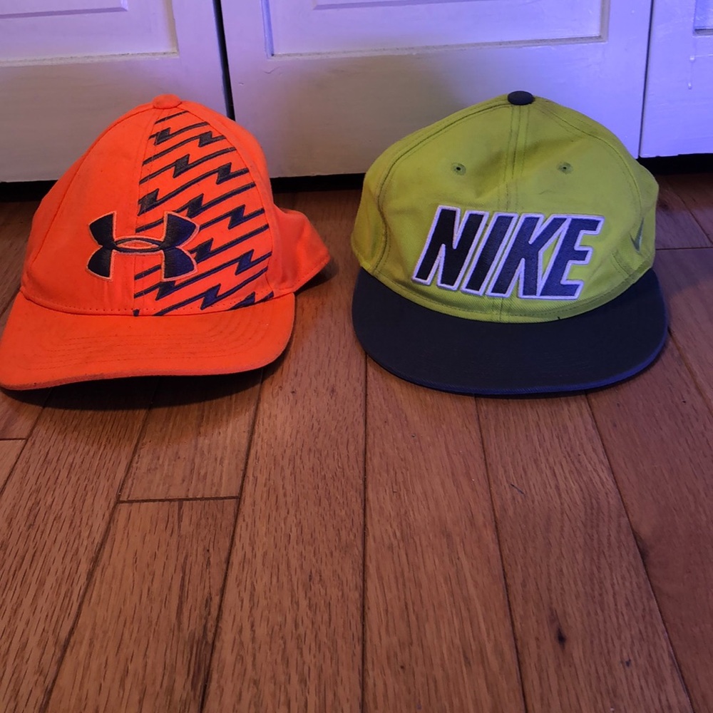 Youth under Armour hat and adult Nike